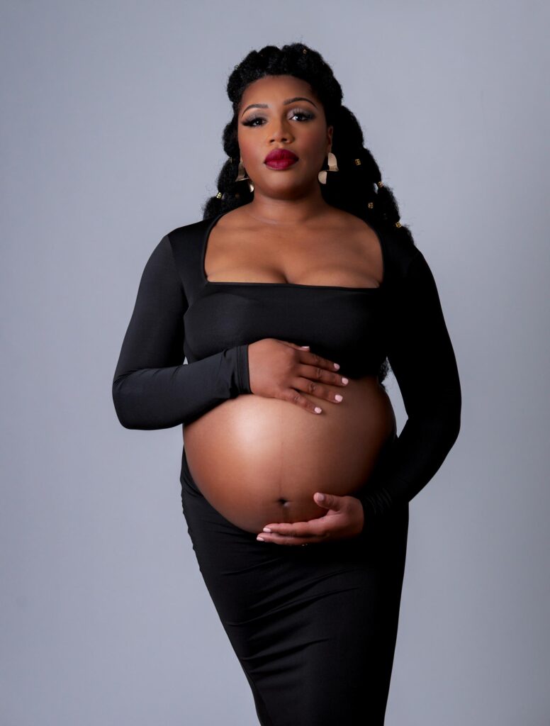 Expecting mom posed with bump in maternity photoshoot