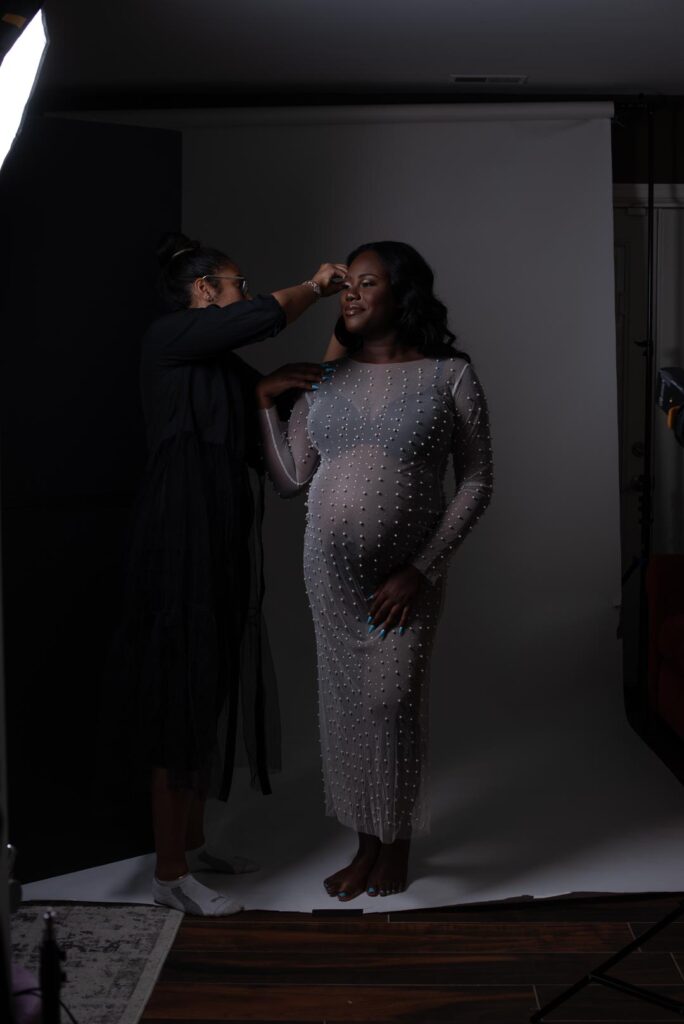 Maryland Maternity Photographer - Hair and Makeup Artist Sierra fixing hair during session