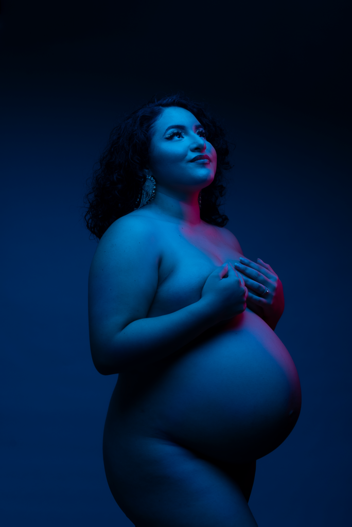 Snapzbytie Photography - Maryland Maternity Photographer - Color Gel Nude Pregnant Photoshoot - Nude Mom Draped in Color Blue and Purple Highlights